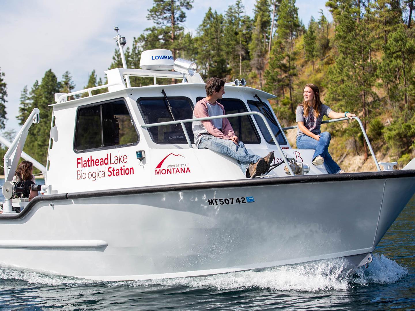 Students on a research vessel at the Flathead Lake Biological Station
