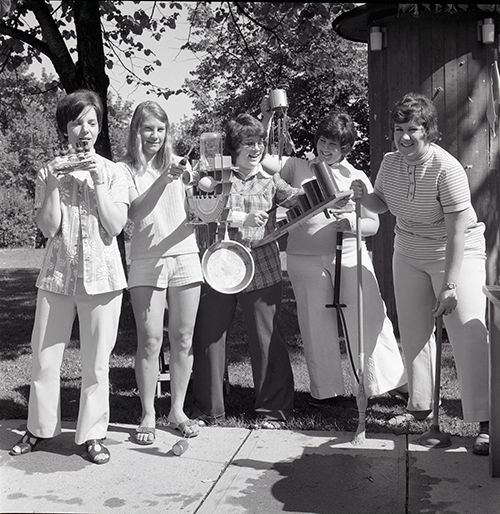 A group of music teachers plays instruments.