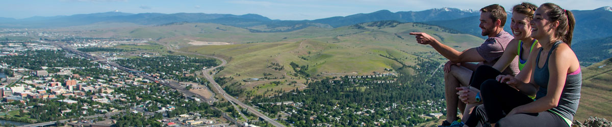Students looking out at Missoula from Mount Sentinel. 