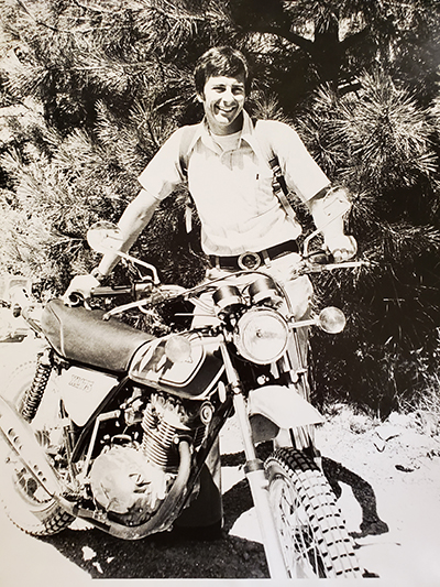 Joel with his new Honda XL 175 motorcycle, circa 1971, his first year at the University of Montana. 