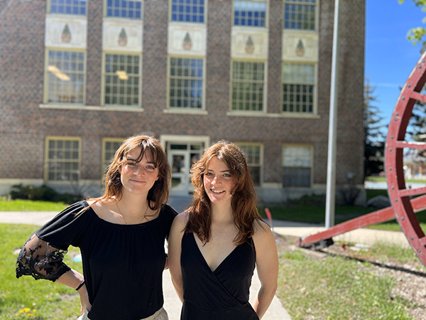 Jaiden (left) and Jocelyn on campus for UM’s grad week events.