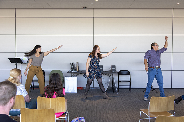 Kendra Mylnechuk Potter, left, Jackie Vetter, center, and Mack Momberg, right, performing at the Missoula Public Library. Photo by Andy Kemmis